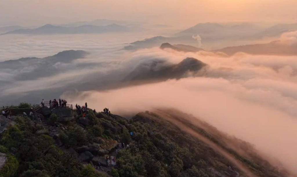The sunrise at Dong Pagoda, where clouds merge with the mountains, captivates every visitor.